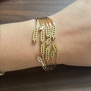 Gold plated stainless steel leaf bangle bracelet